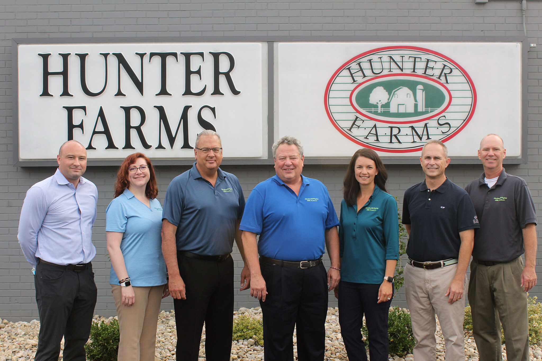 group of executives at hunter farms plant