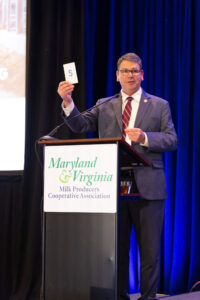 Virginia Secretary of Agriculture and Forestry Matt Lohr speaks to MDVA members about looking at life a little differently to every individual using cards with letters on them as examples during his dinner conversation at the MDVA Annual Meeting on Wednesday, March 27, 2024.